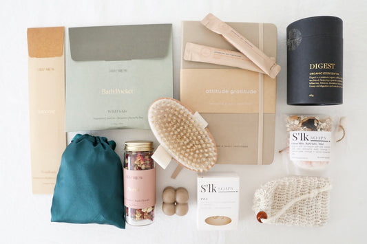 A flat lay of self care products, that is for the wellness gift box
